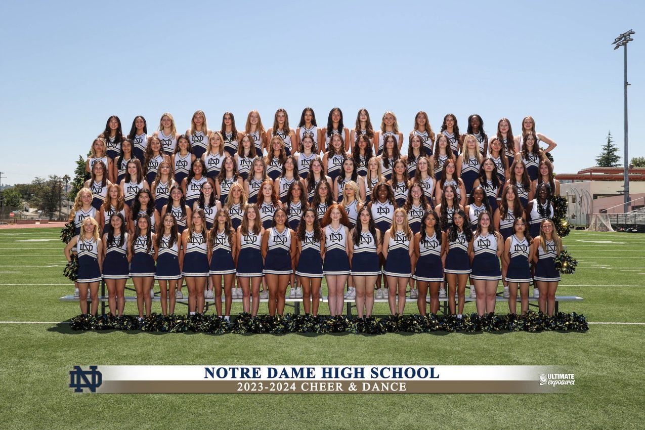 Notre Dame High School 2023-2024 cheer and dance team photo on football field
